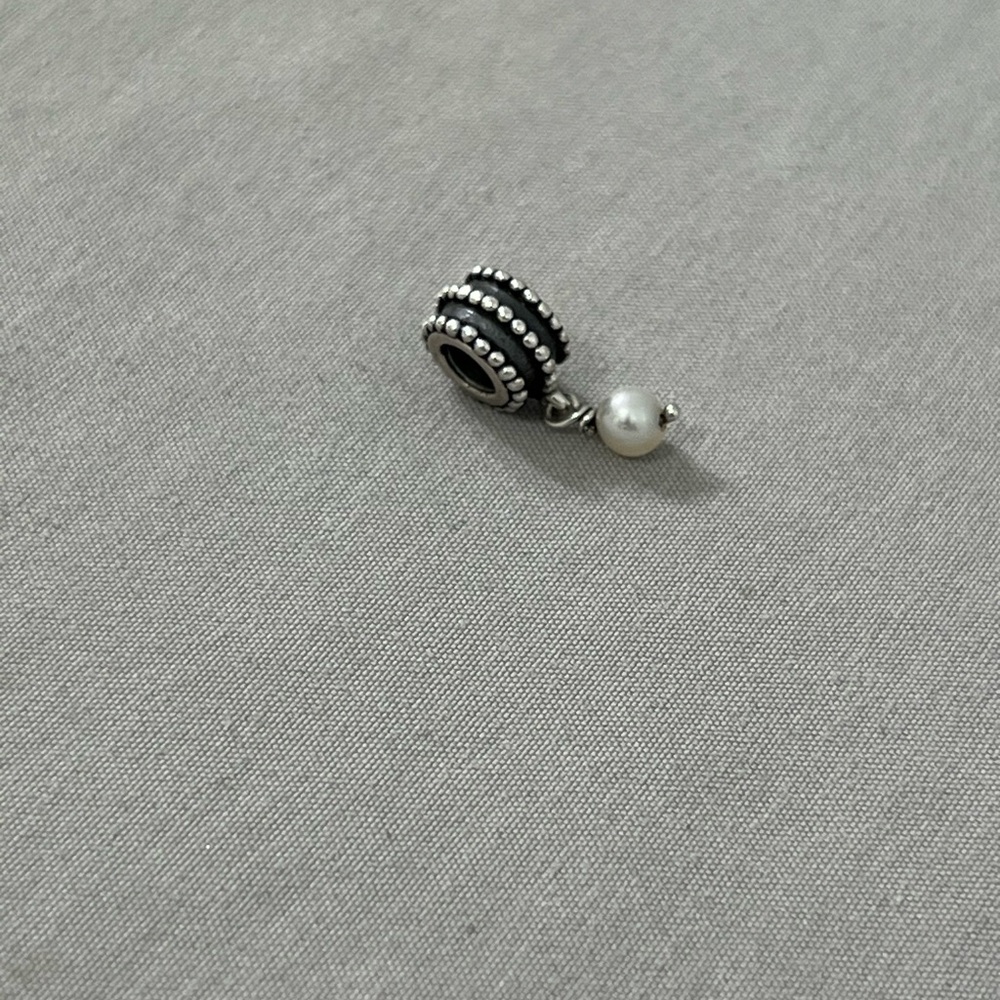 Elegant Silver and Pearl Charm